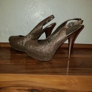 Gold glitter spiked high heels